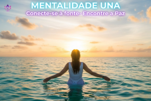 Mulher de vestido leve contemplando o mar, simbolizando a paz da Mentalidade Una e a conexão com a Fonte Divina.